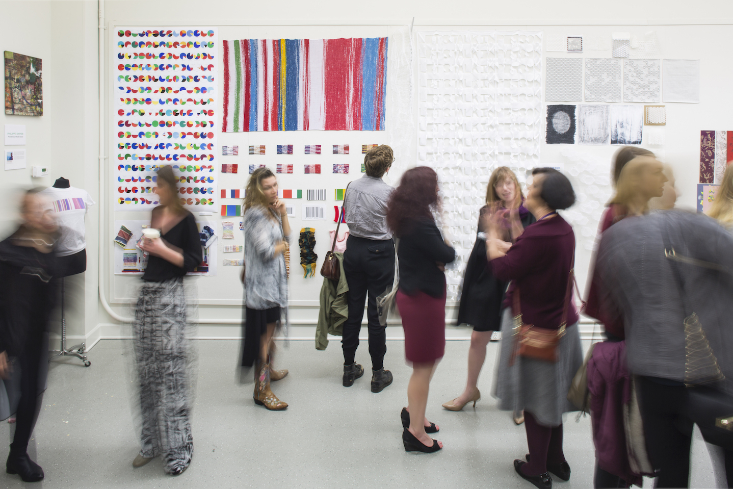 attendees at fibers open studio event