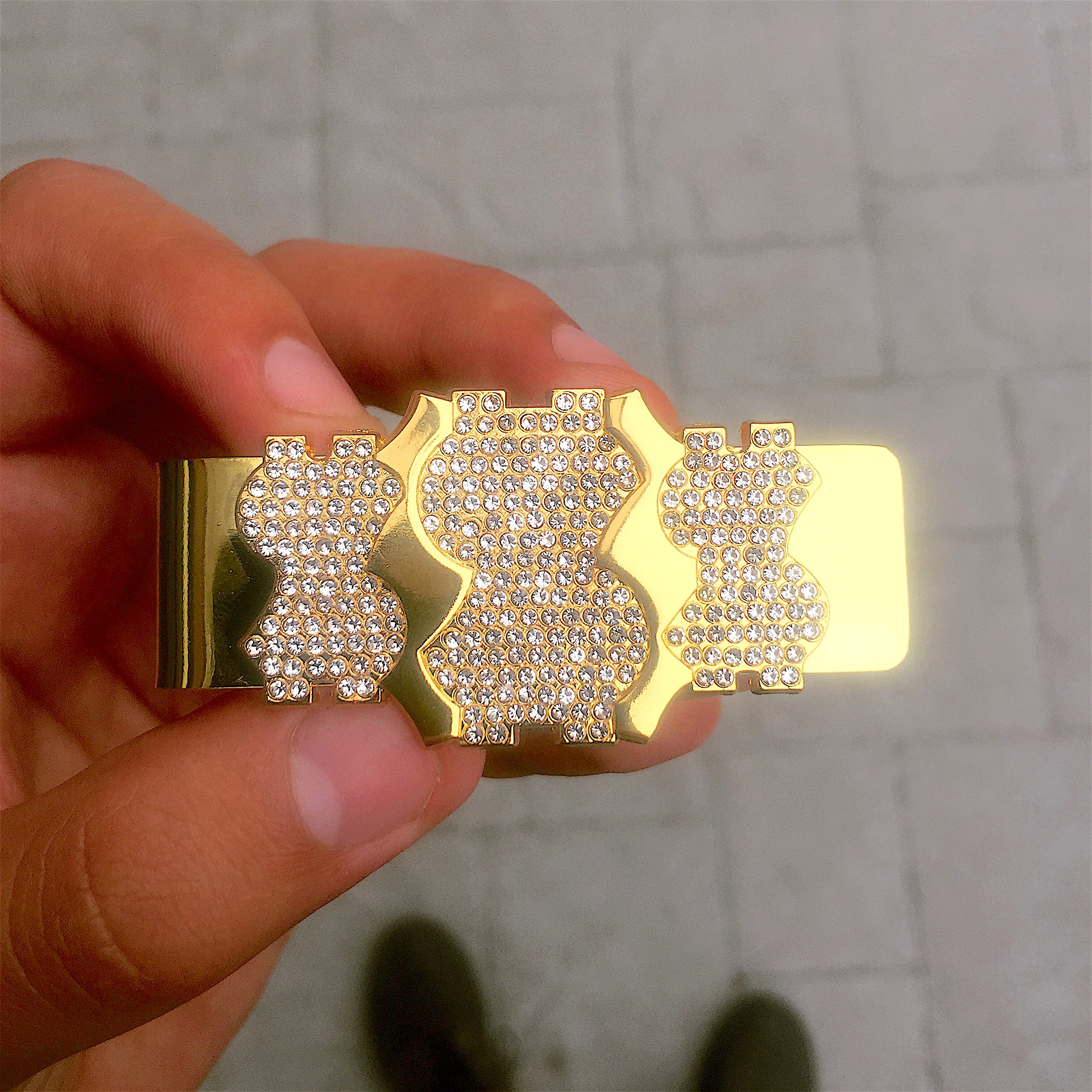 Gold money clip with crystal dollar signs
