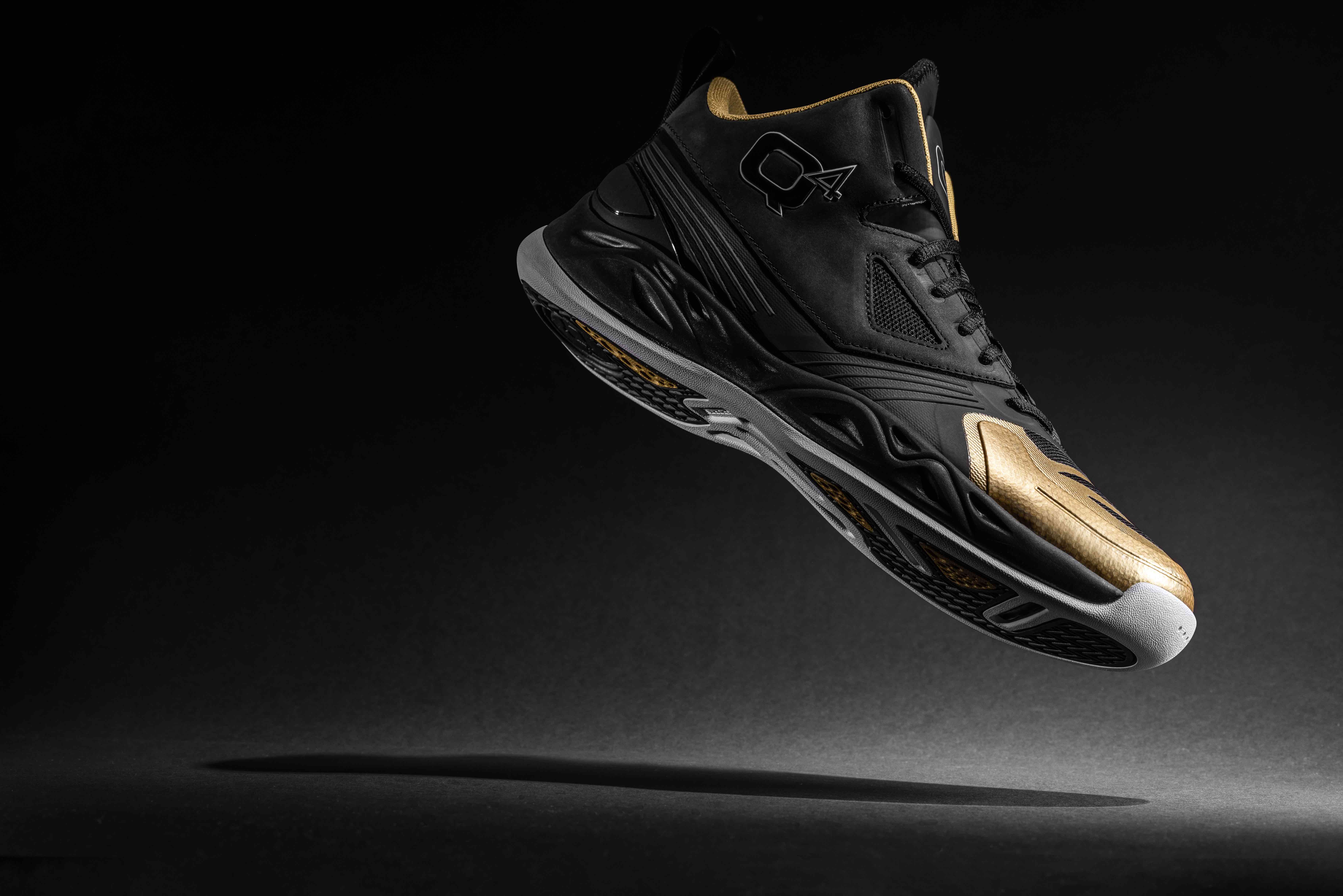 Sneaker designed by Design by Quintin Williams (B.F.A., industrial design, 2011) for Q4 Sports.