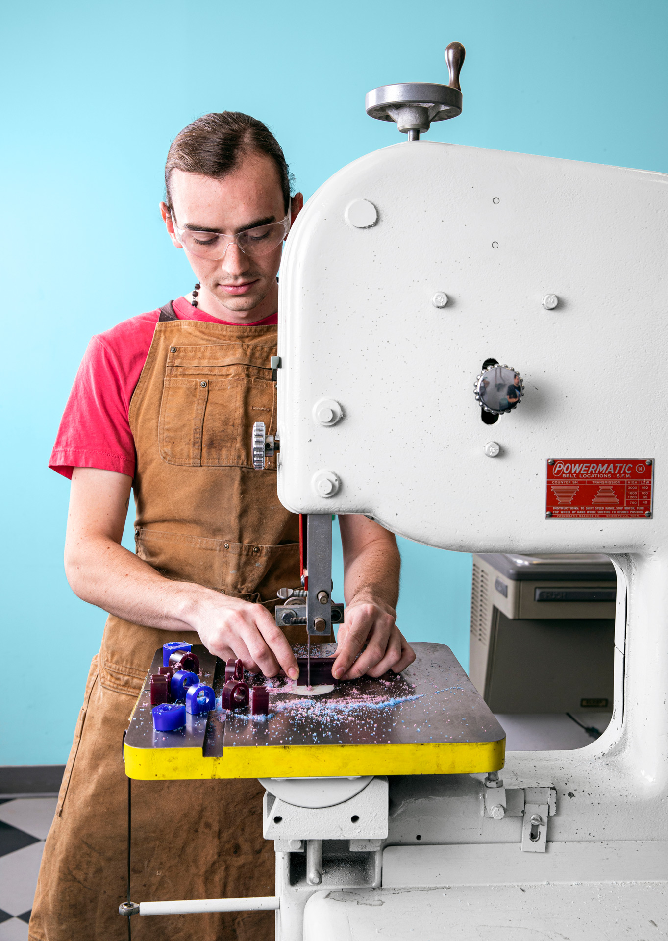 Jewelry student works on equipment in Fahm Hall