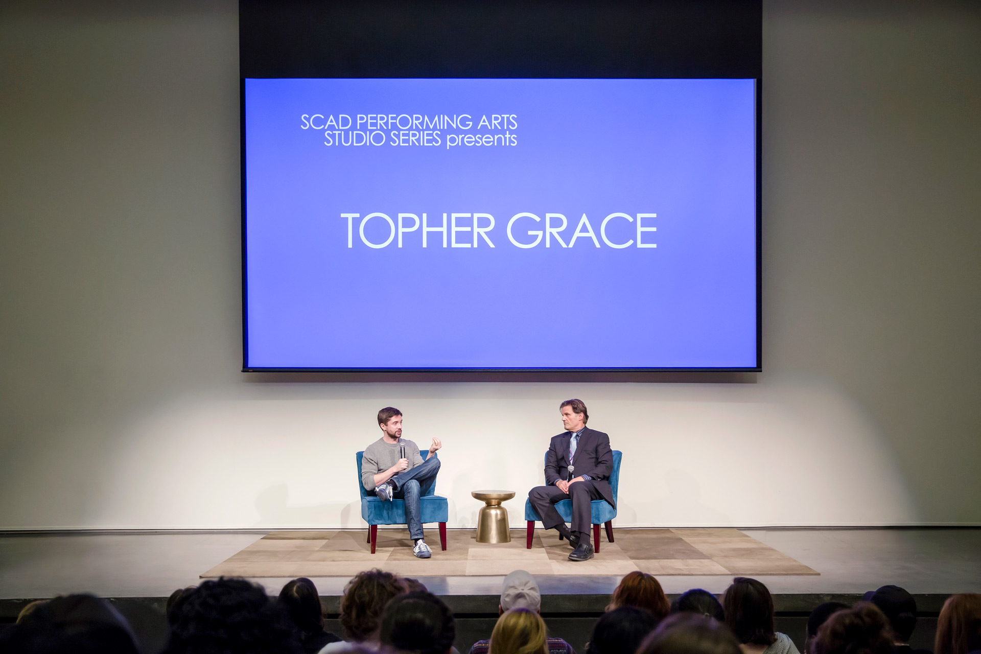 Actor Topher Grace on stage at SCAD's performing arts series