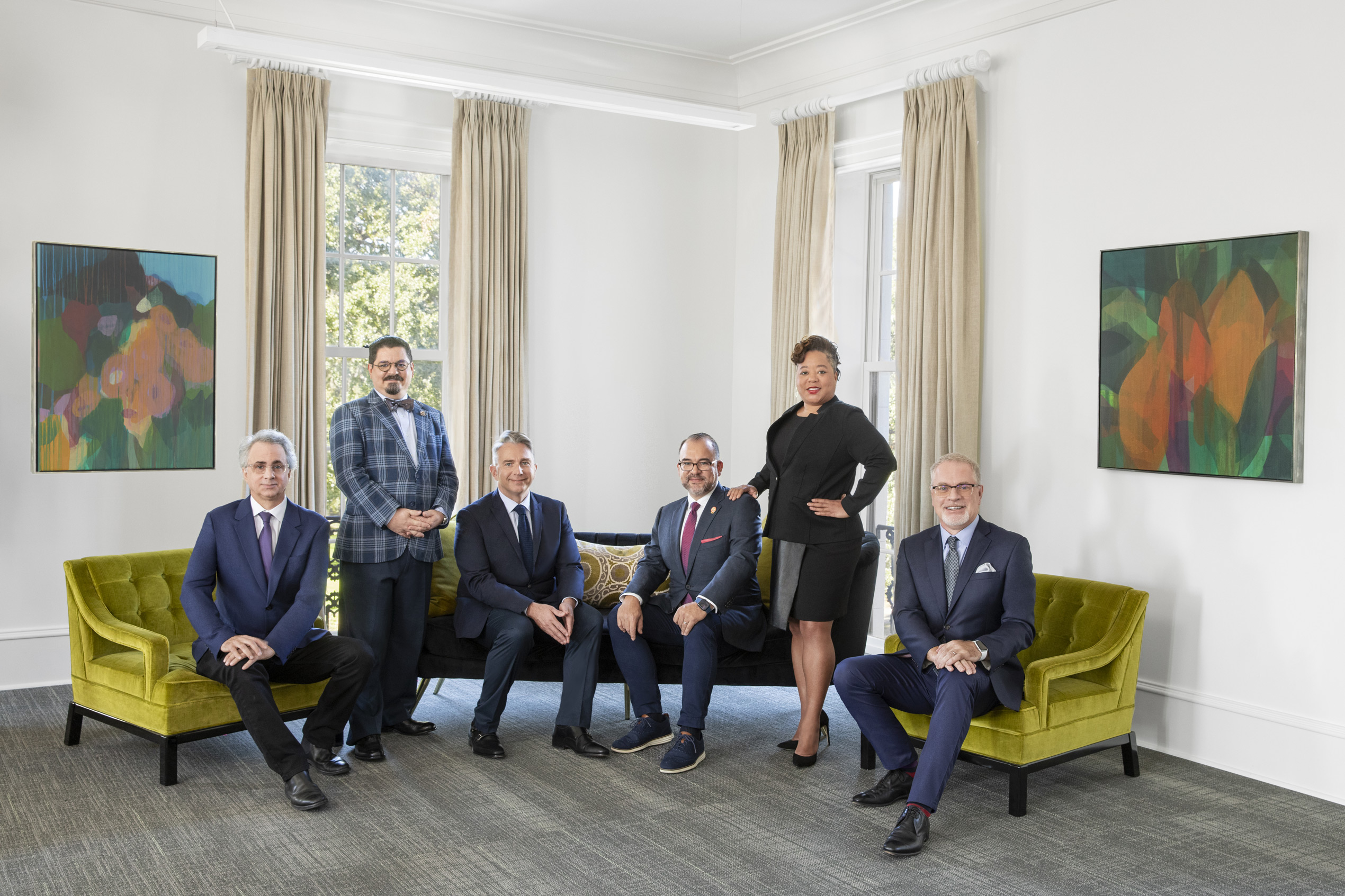 SCAD School of Business Innovation leaders Victor Ermoli (standing, left) and Meloney Moore (standing, right) are flanked by (seated, left to right) faculty leads Chris Peeler, Alessandro Cannata, Oscar Betancur, and John Denham.