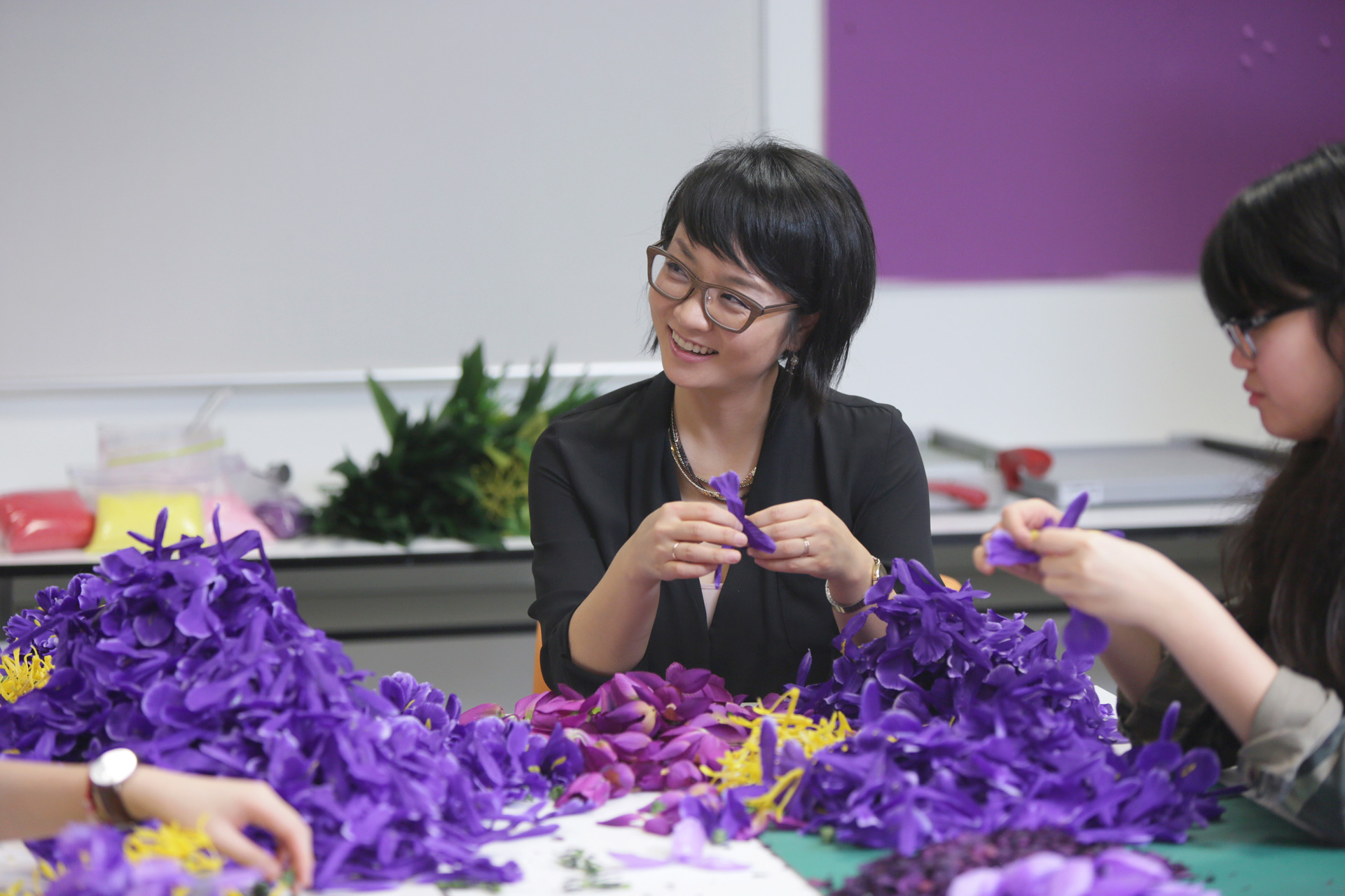Gyun Hur assembles a silk flower