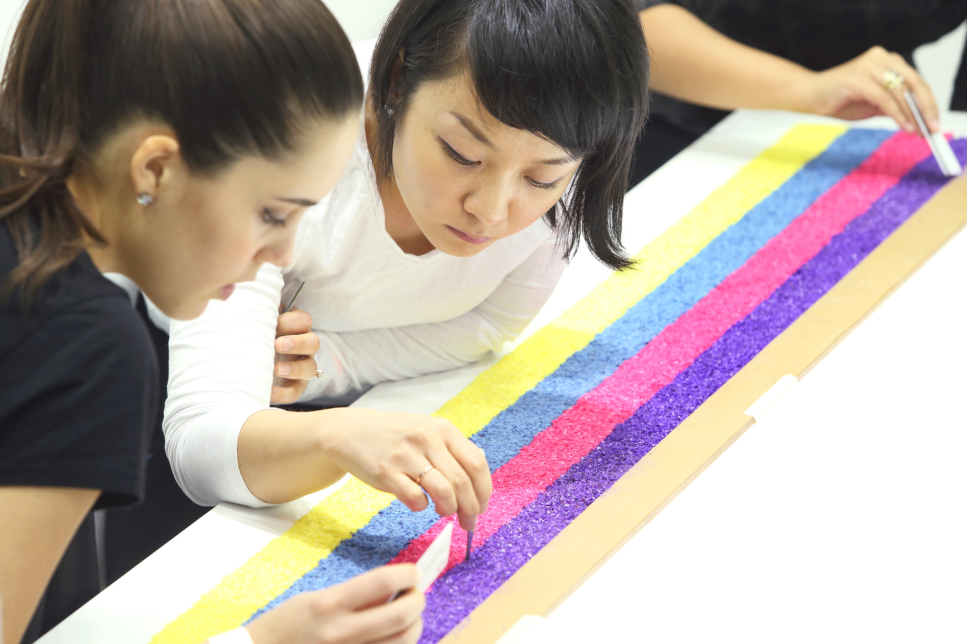 SCAD alumni work on a site-specific installation at Art Central in Hong Kong