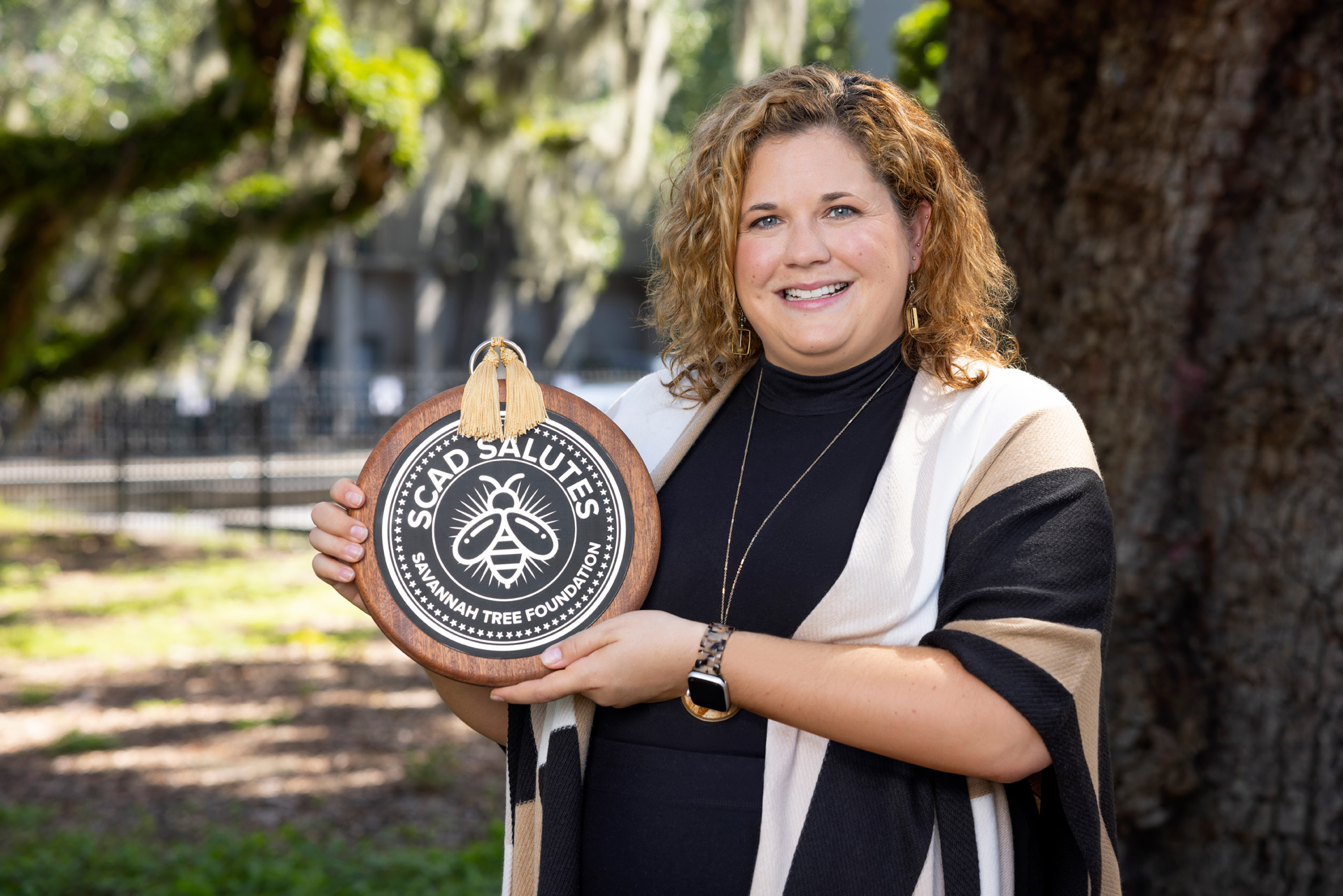 Zoe Rinker, executive director of the Savannah Tree Foundation, receives the SCAD Salutes award