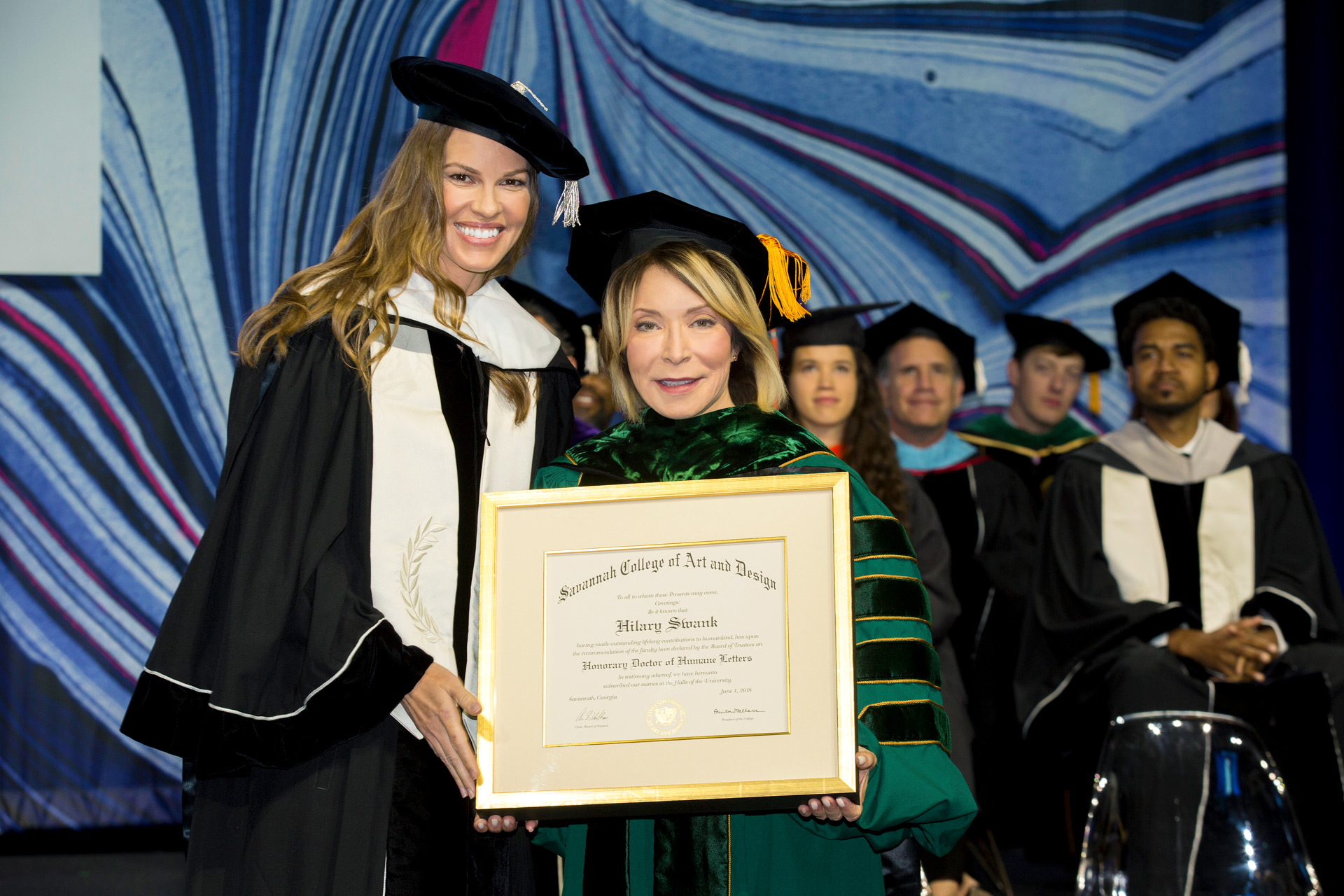 SCAD founder and president presents honorary degree to Hillary Swank