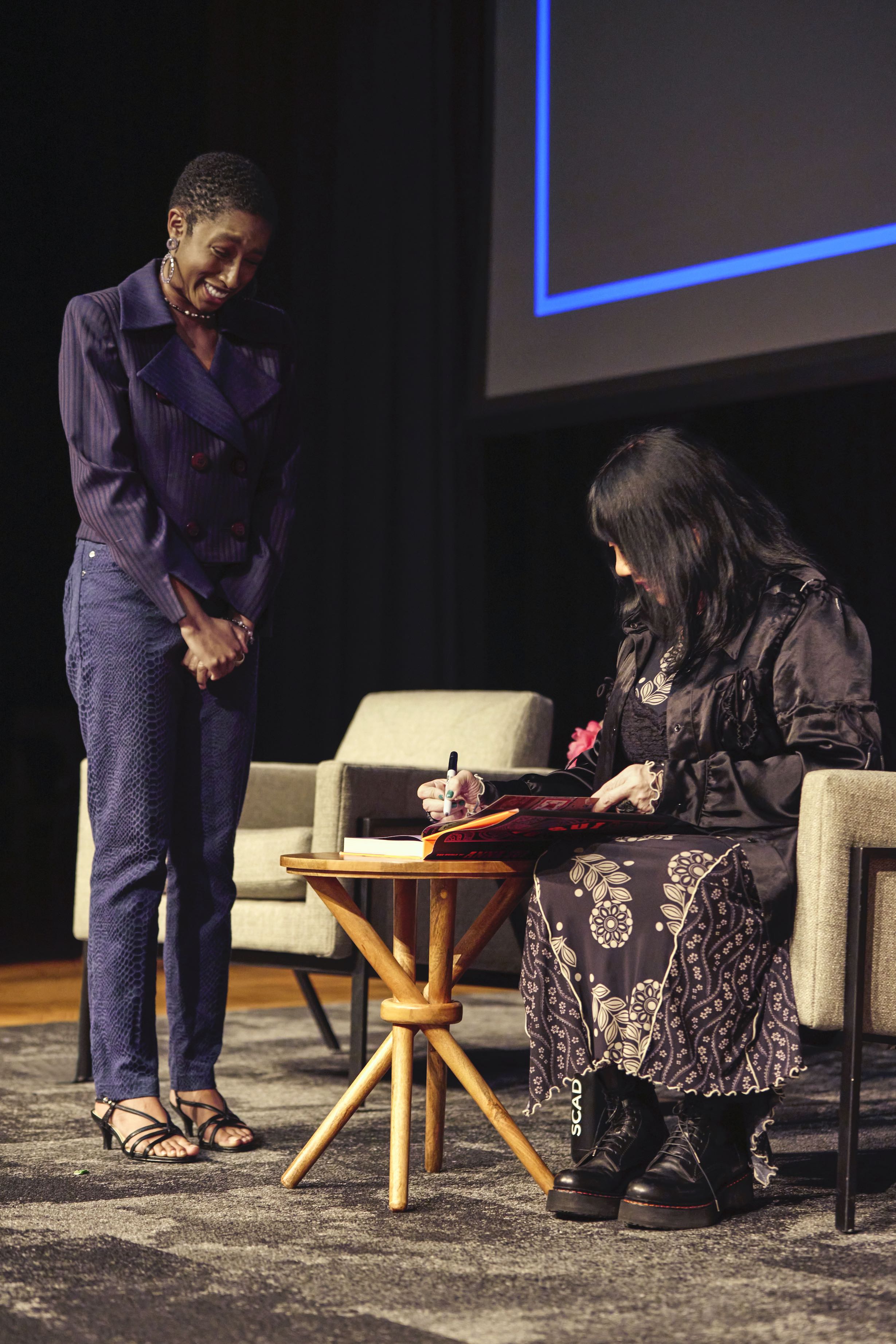 Signing a book