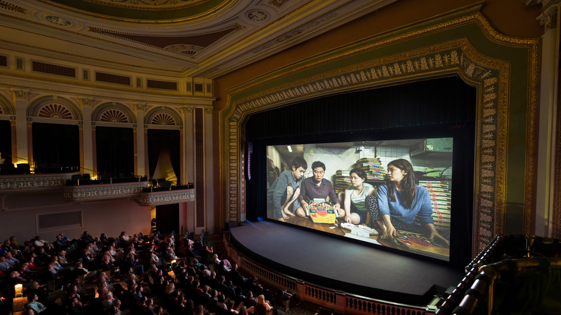 An audience screens the movie 