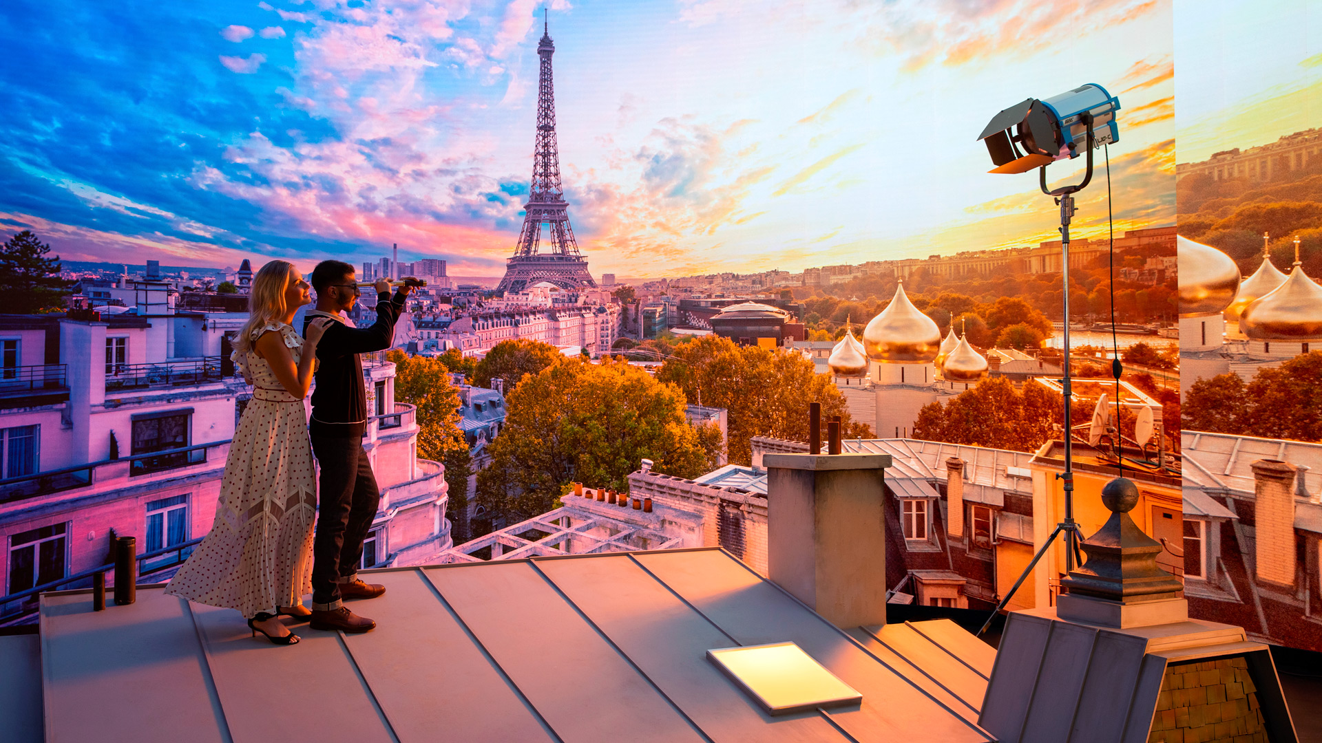 Close up of couple in front of Paris backdrop