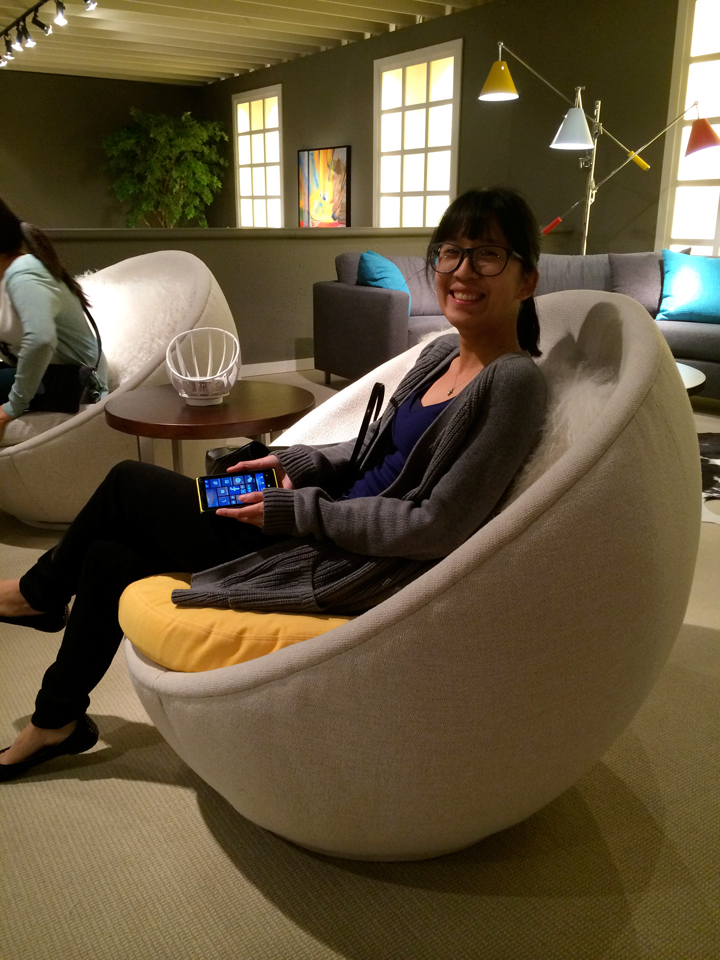 Student sits in rounded chair