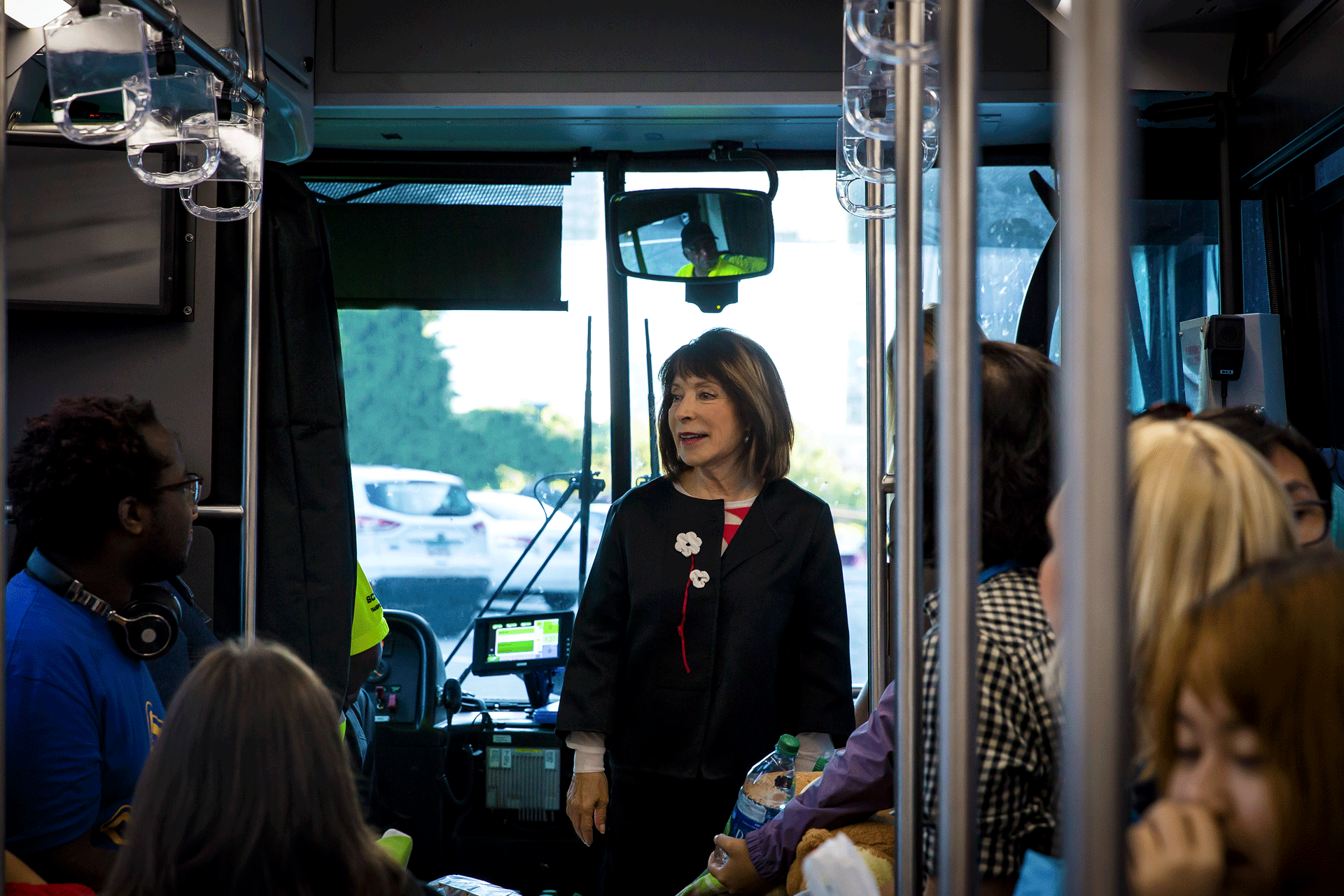 SCAD founder and president joins students on bus