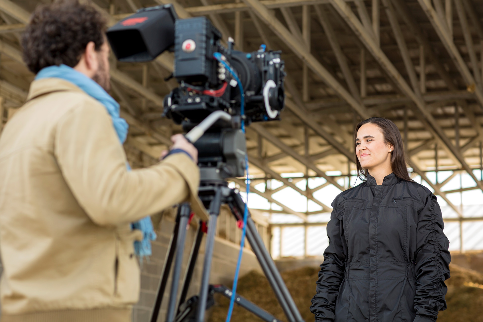 Filming woman in jumpsuit