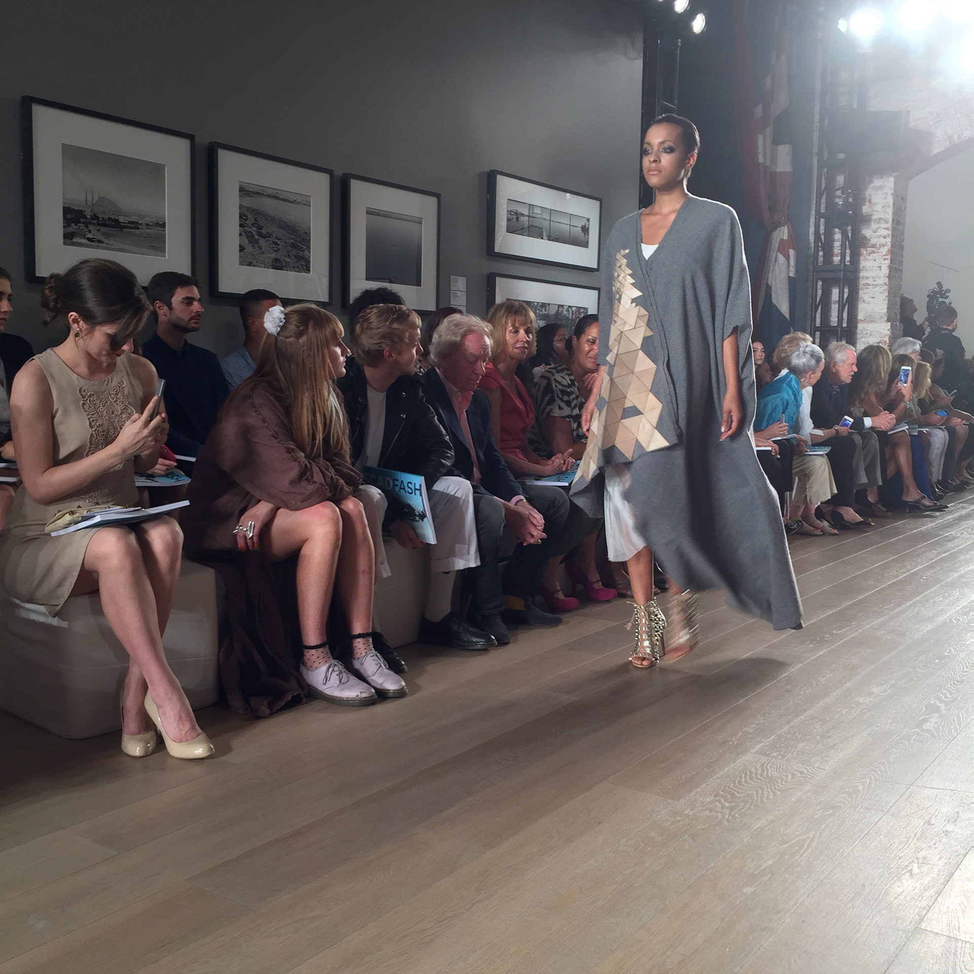 Model walks down the runway wearing a garment designed by Molly Sayers