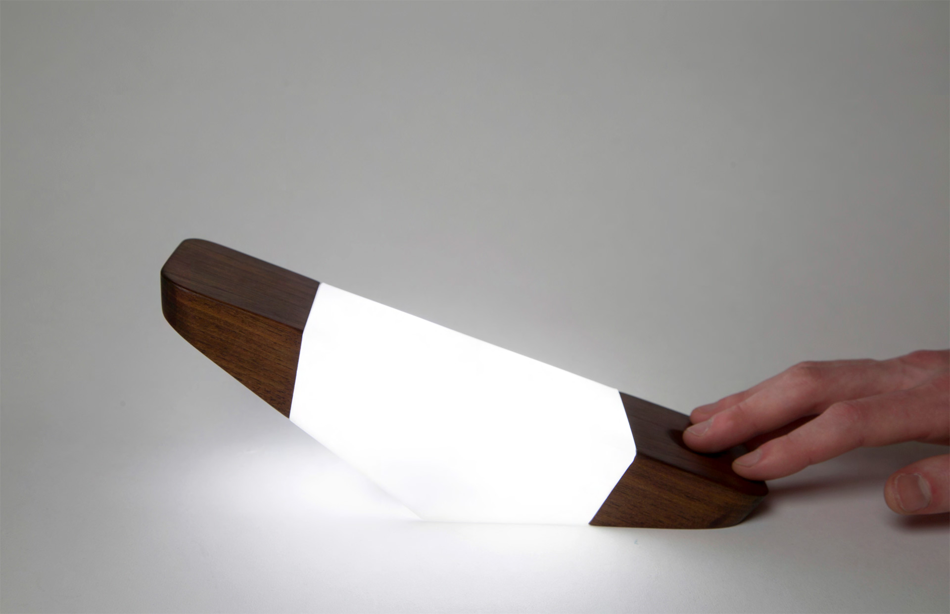 Demonstration of how to turn the Prism bedside lamp
