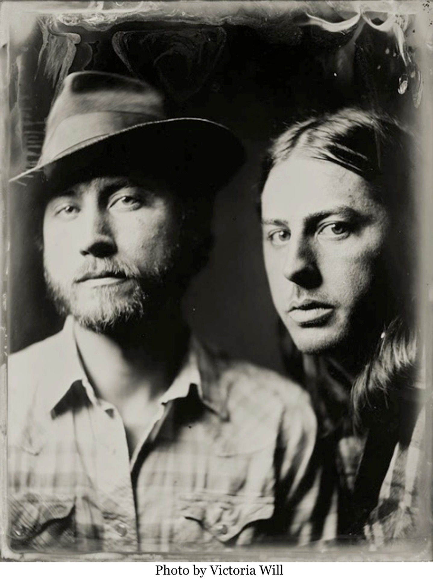 Black and white photo of the Ross brothers