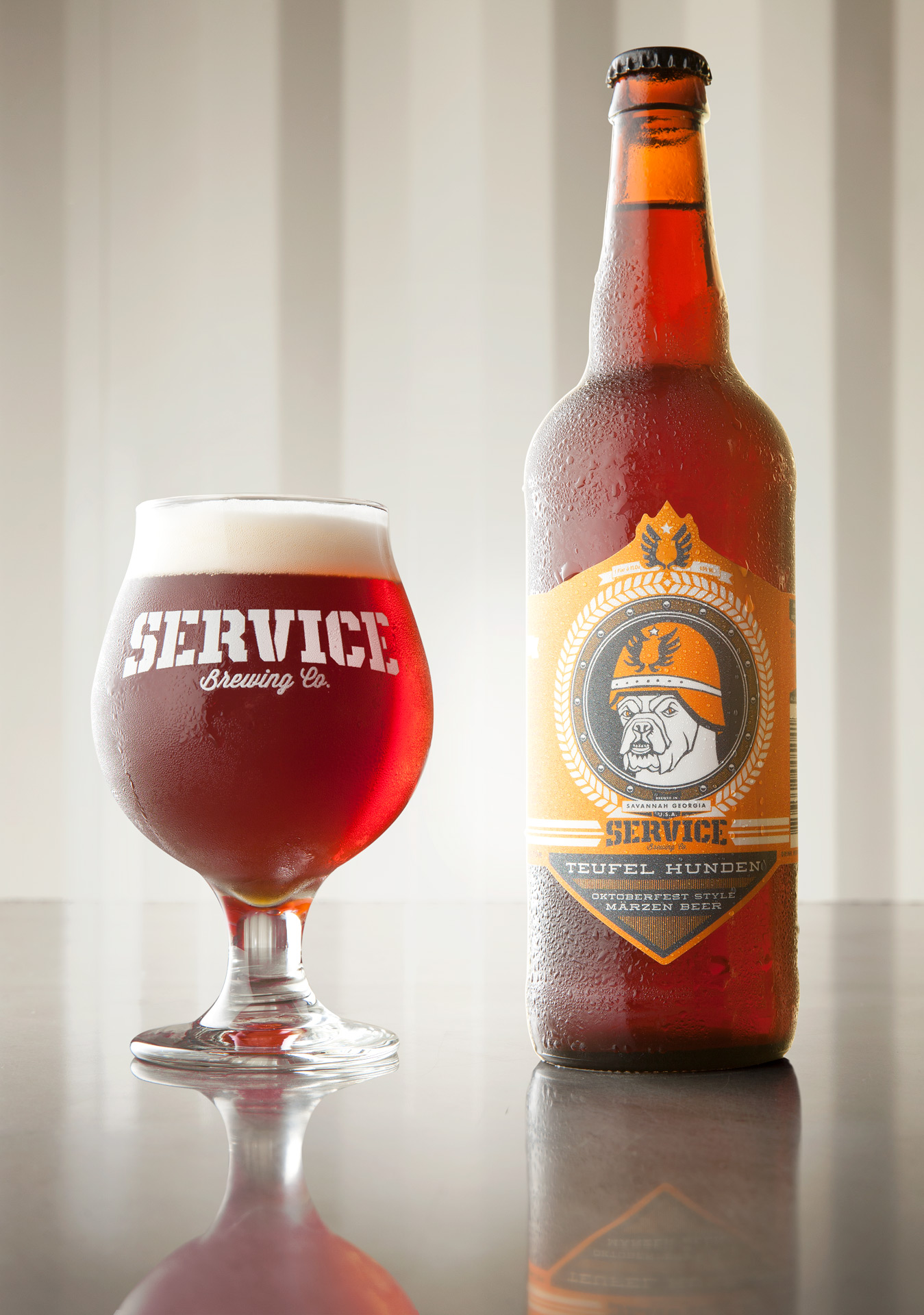 Servicing Brewing Company bottle and glass