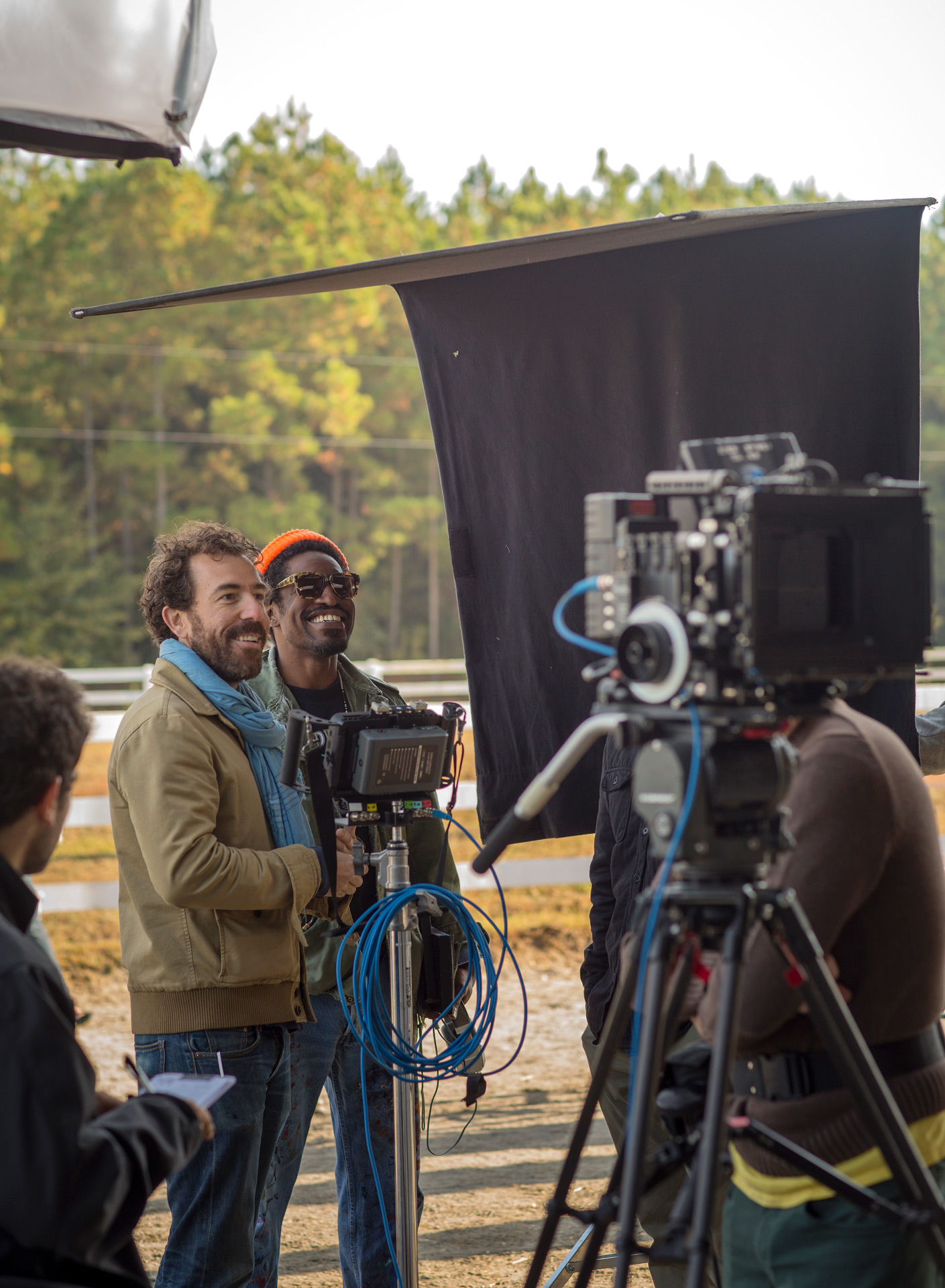 Director Greg Brunkalla and André 3000 on set