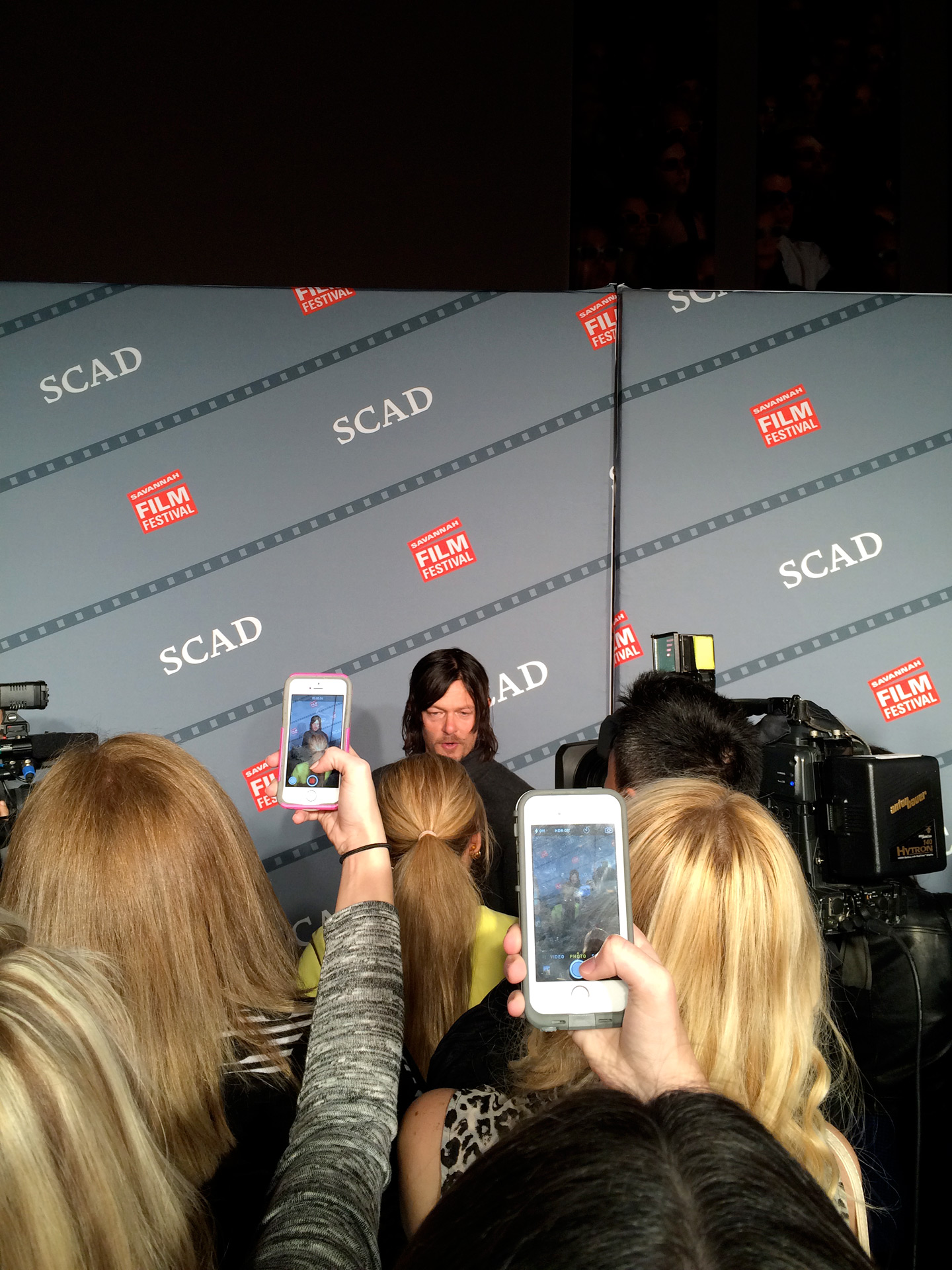 Norman Reedus has his photo taken on the red carpet