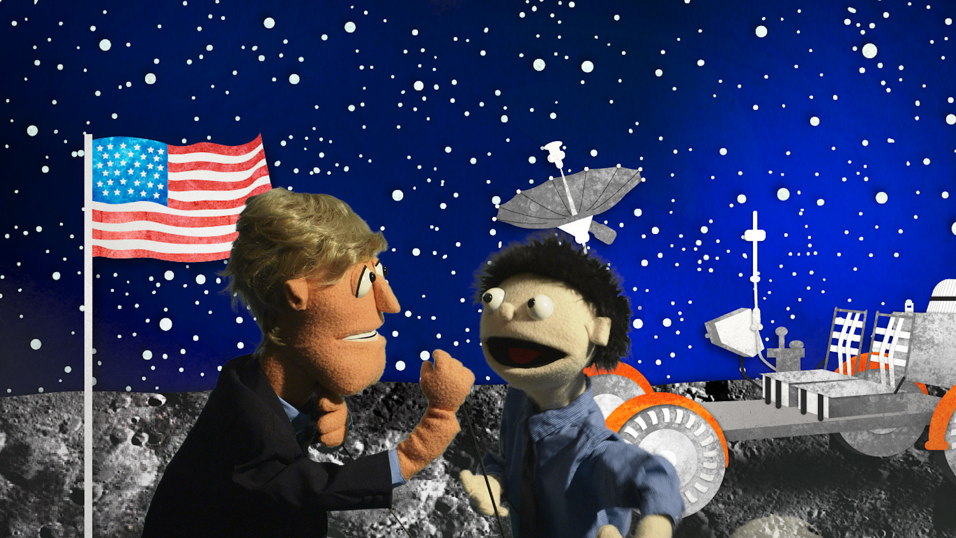 Two puppets talk with a scene of the moon landing behind them