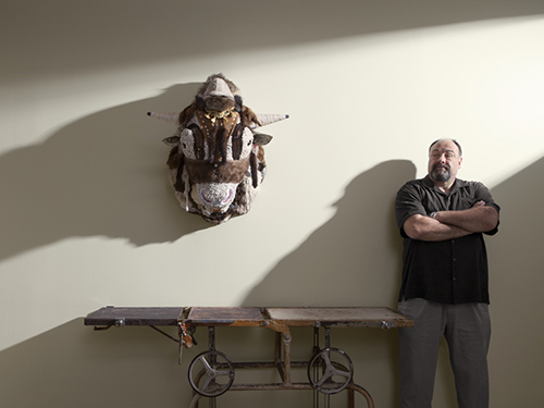 James Gandolfini stands next to Marcus Kenney's work