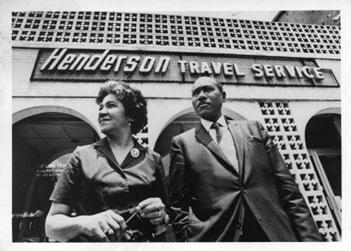 Freddye and Jake Henderson in front of the Henderson Travel Service