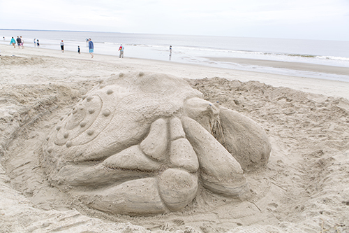 Sand sculpture of hermit crab