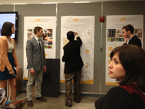 School of Design dean provides feedback to students work 