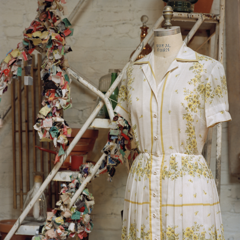 Floral sundress on a dress form inside the Domestic Construction studio