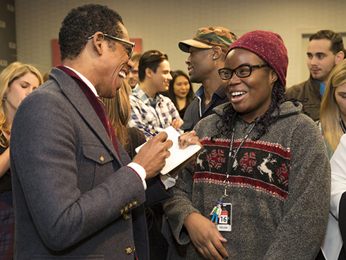 Orlando Jones with student