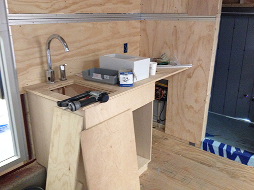 Sink and kitchen area under construction in SCADpad