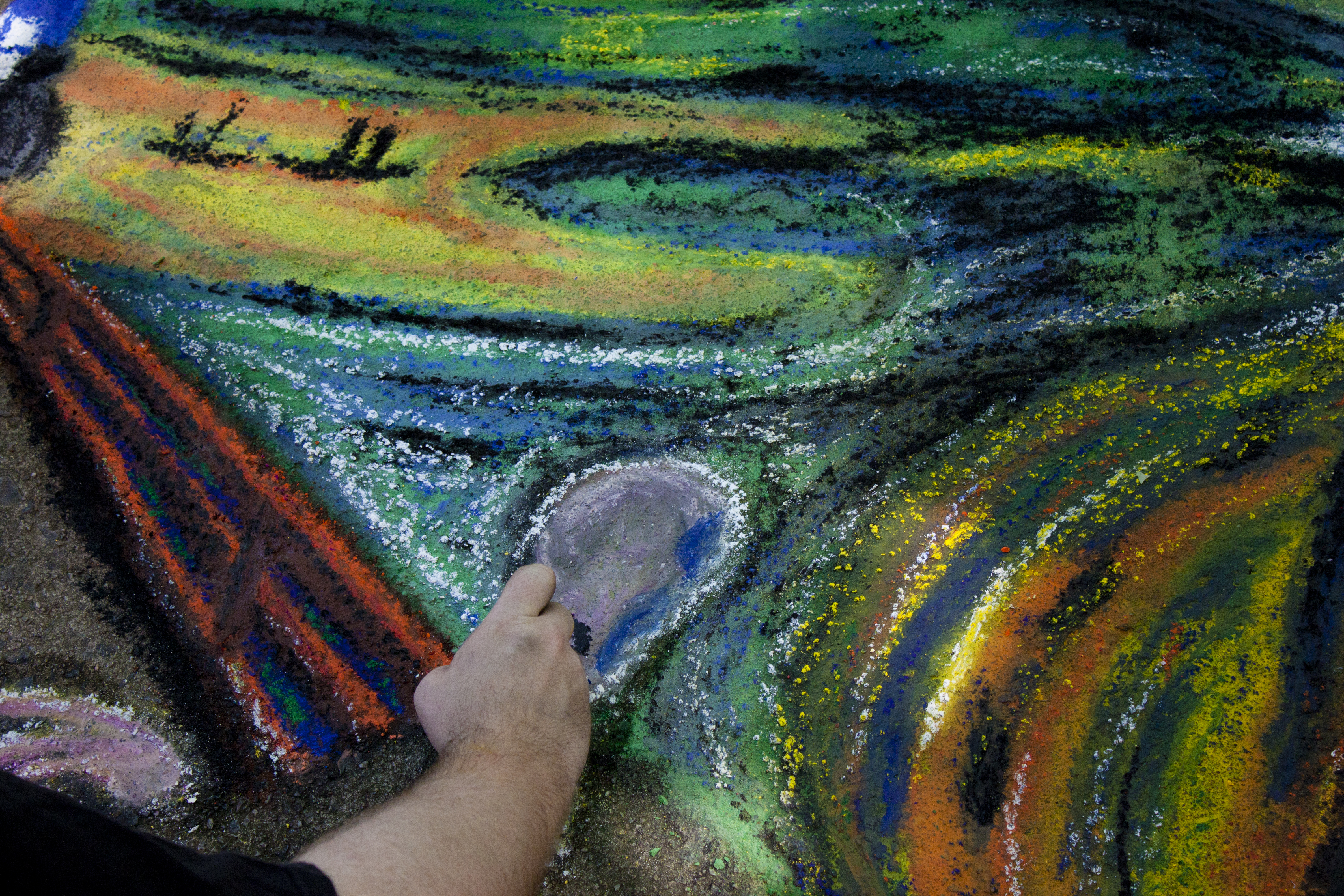 Working on sidewalk chalk art