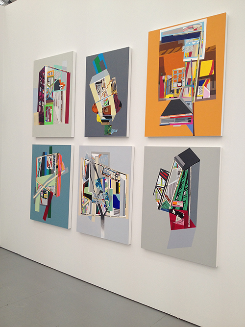 Six works of art hung on gallery wall