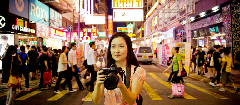 Photography student shooting in Hong Kong Photography student shooting in street of Hong Kong