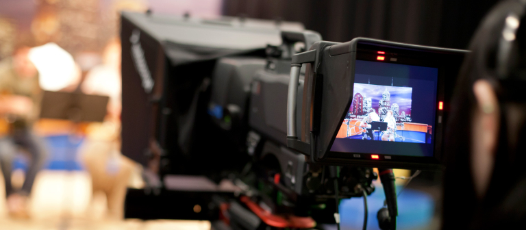 Camera captures a scene on television set