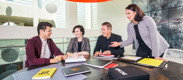 Students and faculty work on a project for Lenova through SCADpro