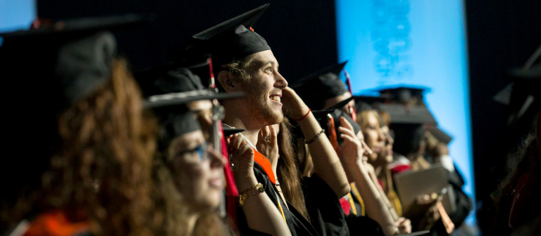 Graduates at a SCAD commencement ceremony