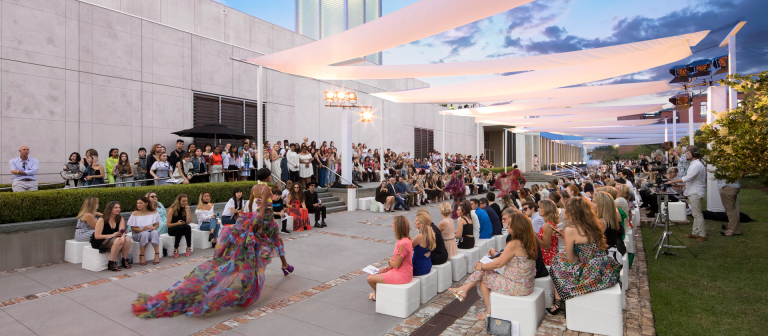 Model walking runway at Savannah fashion show at scad museum
