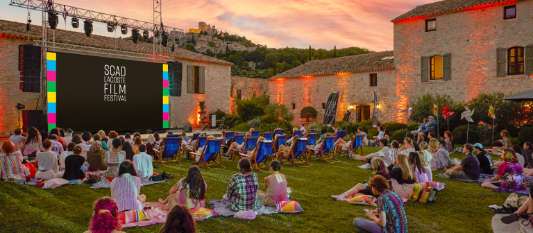 Lacoste film festival attendees at an outside screening