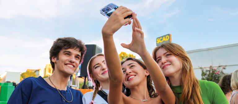 Students taking a selfie during SCAD welcome week