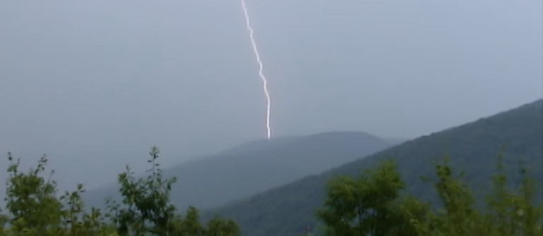 Lightening strikes a mountain 