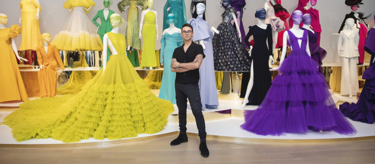 Cristian Siriano with gowns