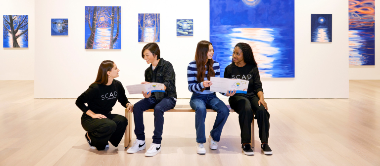 Museum visitors with docents