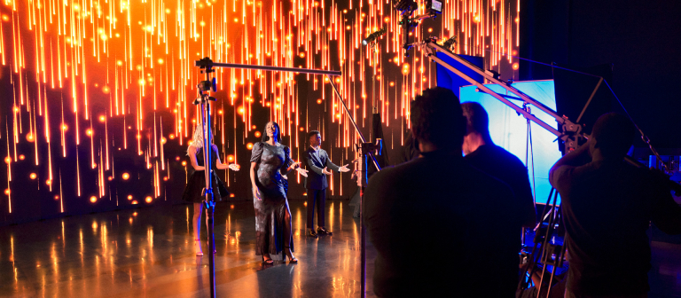 HoneyBees performing on LED volume stage