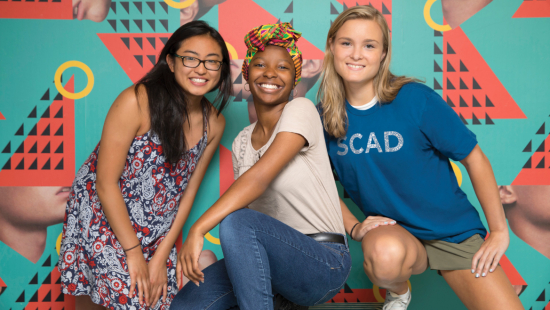 Students pose for a picture at a SCAD Summer Seminar
