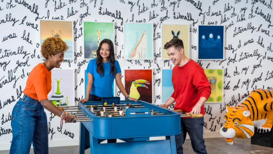 SCAD students playing air hockey
