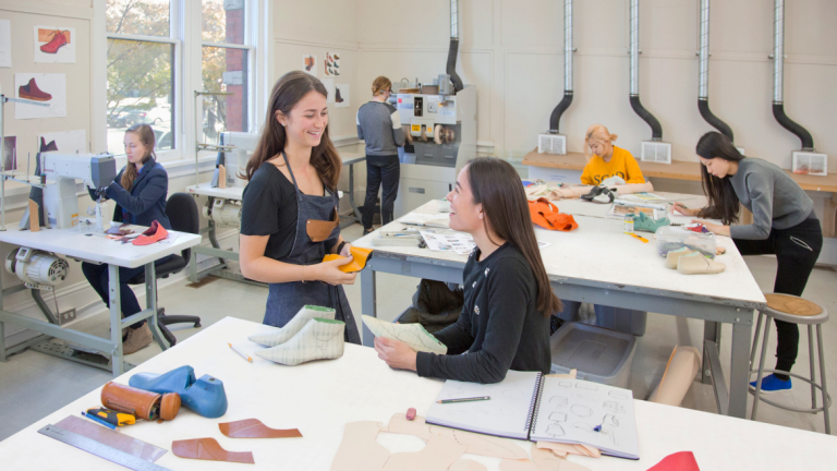 Accessory design students making shoes in Eckburg Hall