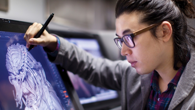 Animation student drawing on Cintiq