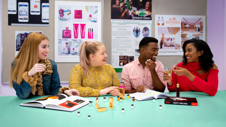 Students in the business of beauty and fragrance program collaborate with an industry insider