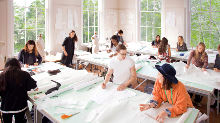Students in the School of Fashion work collaboratively in Eichberg Hall