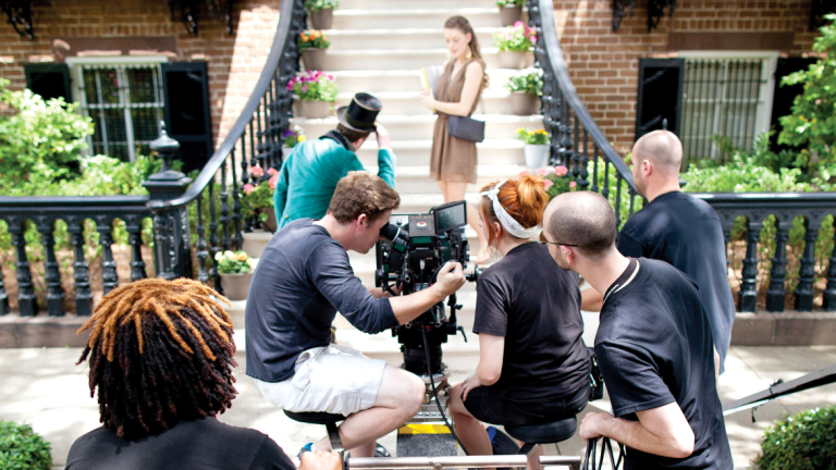 SCAD students working on film set SCAD students shooting scene from film